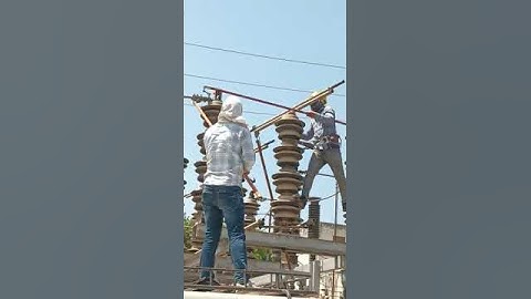 isolator jaw tightening Live line maintenance 132 kv