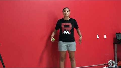 Glute trigger point release against wall