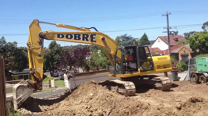 excavating a site cut sumitomo sh210
