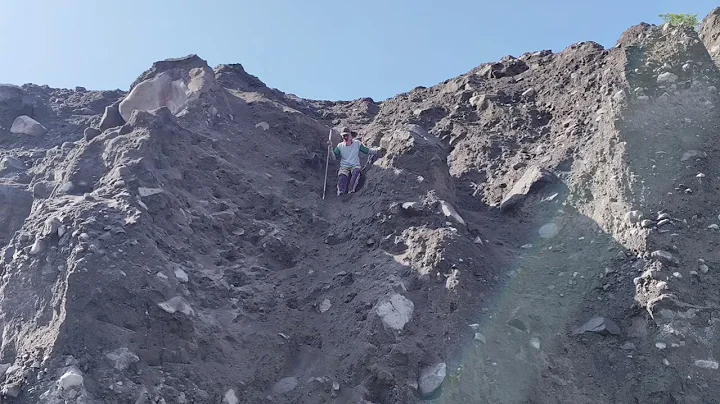 Challenging Death, If The Cliff Collapses, lives Are At Stake. 