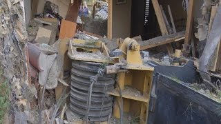 Crane Falls Through House