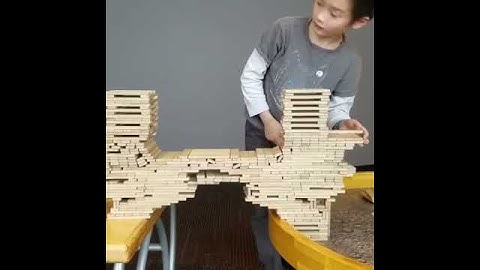 Boy Making a Bridge at the Great Lakes Science Center
