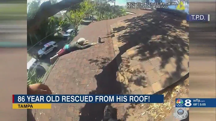 Tampa Police officers rush to save man stranded on roof