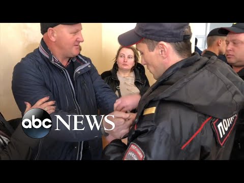 Russia targets Jehovah’s Witnesses with arrest, raiding of homes.