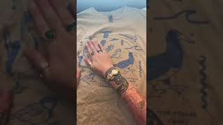 Person does a Gelli plate transfer technique on a t-shirt using acrylic paint!