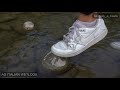 Wetlook - Giulia into the river fully clothed in Nike