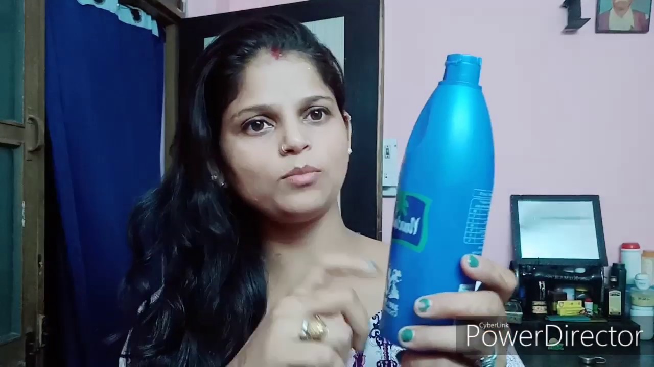 OILING HAIR DIRECTLY WITH A COCONUT OIL BOTTLE / 200 ML. OILING