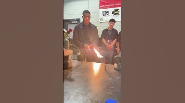 HVAC students learning to light a torch