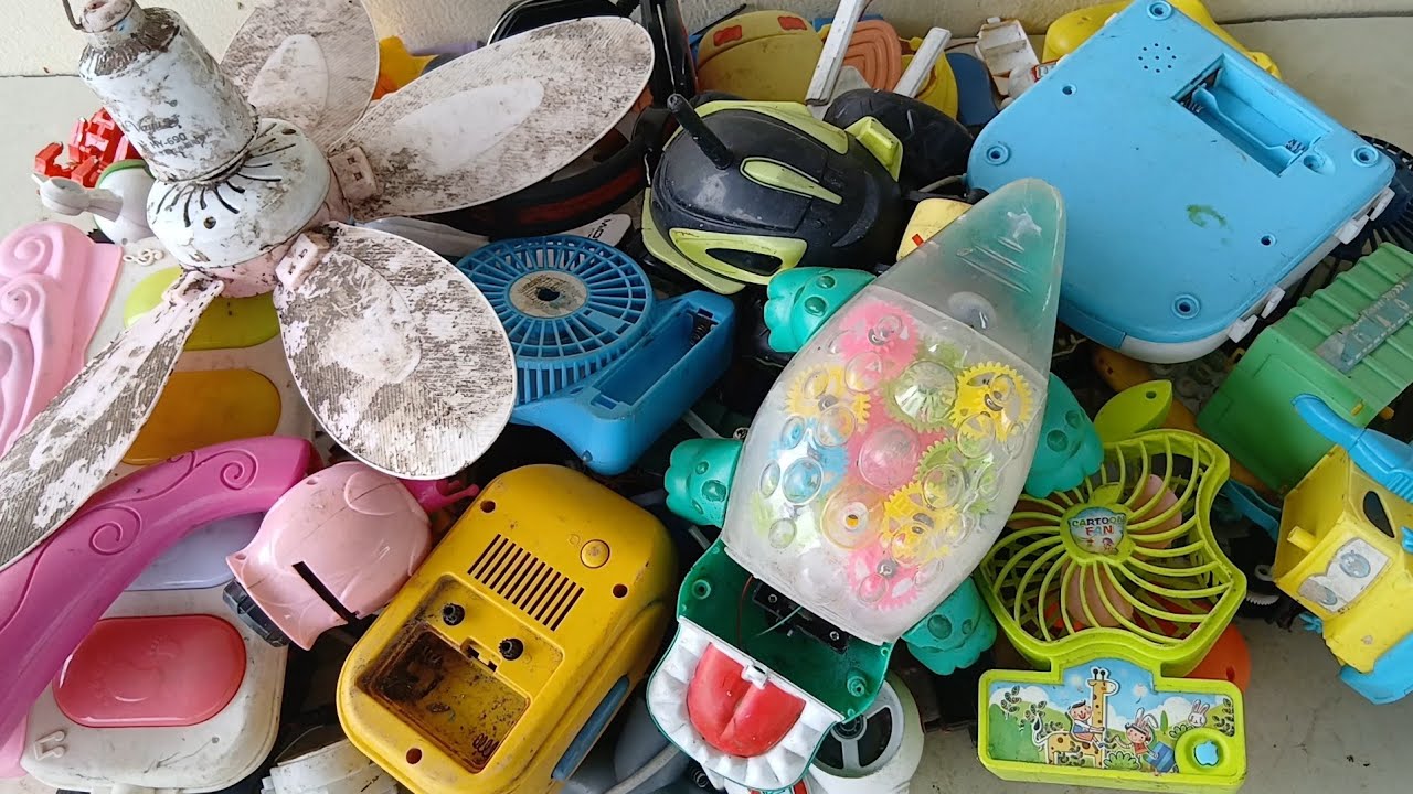 break and open pile of mini fans & old toys|statement of badly damaged ...