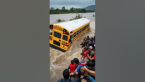 Kids Pulled from Flood Just Before School Bus Swept Away #shorts #viral #disaster #viral #fyp #rain