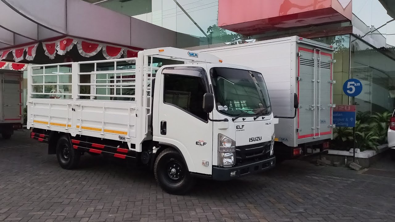 truk 4 roda Isuzu ELF NLR L bak besi dropside Surabaya
