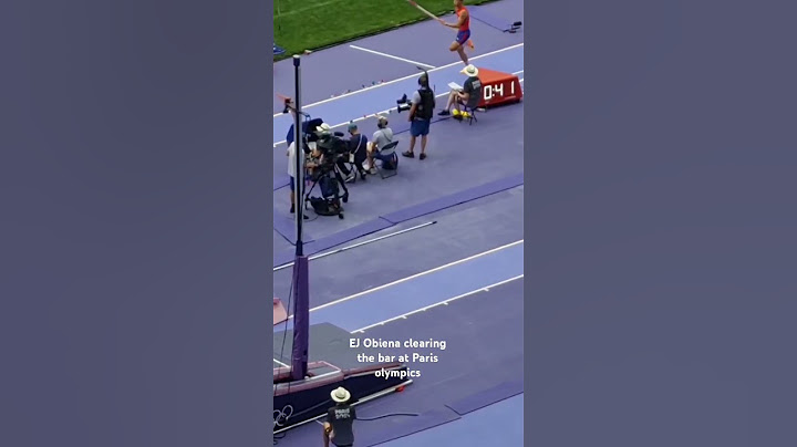 Filipino pole vaulter EJ obiena clearing the bar at Paris Olympics