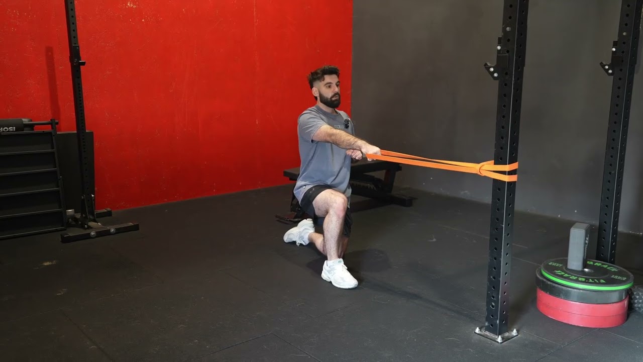 Half kneeling rotational row avec élastique