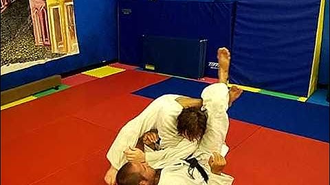 Armbar, Triangle, and Oma Plata submission chain.