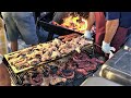 Italy Street Food. Grilled Meat, Pork Legs, Ribs, Sausages, Melted Cheese, Pasta and more