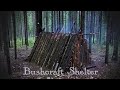 Bushcraft camp: a primitive shelter in the forest