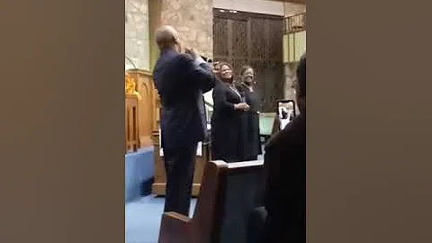 Gil Williams singing his rendition of "Worth" at S...