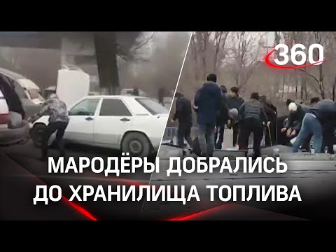 Видео: мародёры сливают бензин из хранилища на заправке в Алматы среди бела дня
