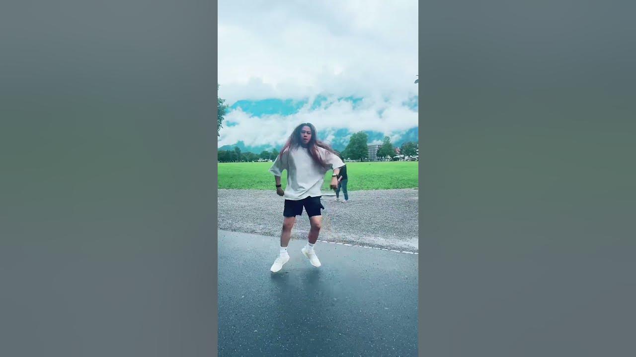 Dancing in Interlaken Switzerland with the paraglide and cloudy mountain background #yt #youtube