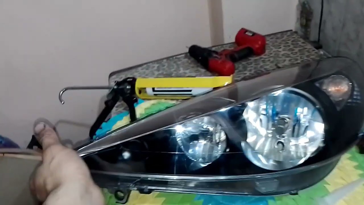 fiz máscara negra no farol do meu Peugeot 207