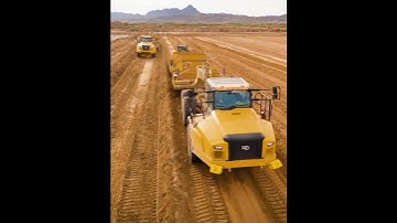 CAT trucks + K-Tec scrapers = a powerful earthmoving combo
