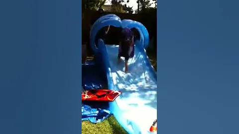 Makena on the water slide at Sage's birthday party