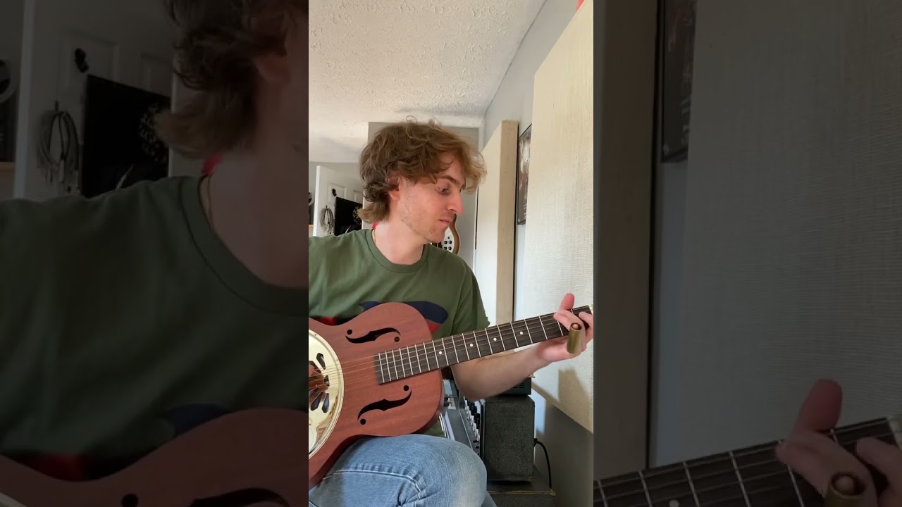 Playing brass slide on my resonator guitar 