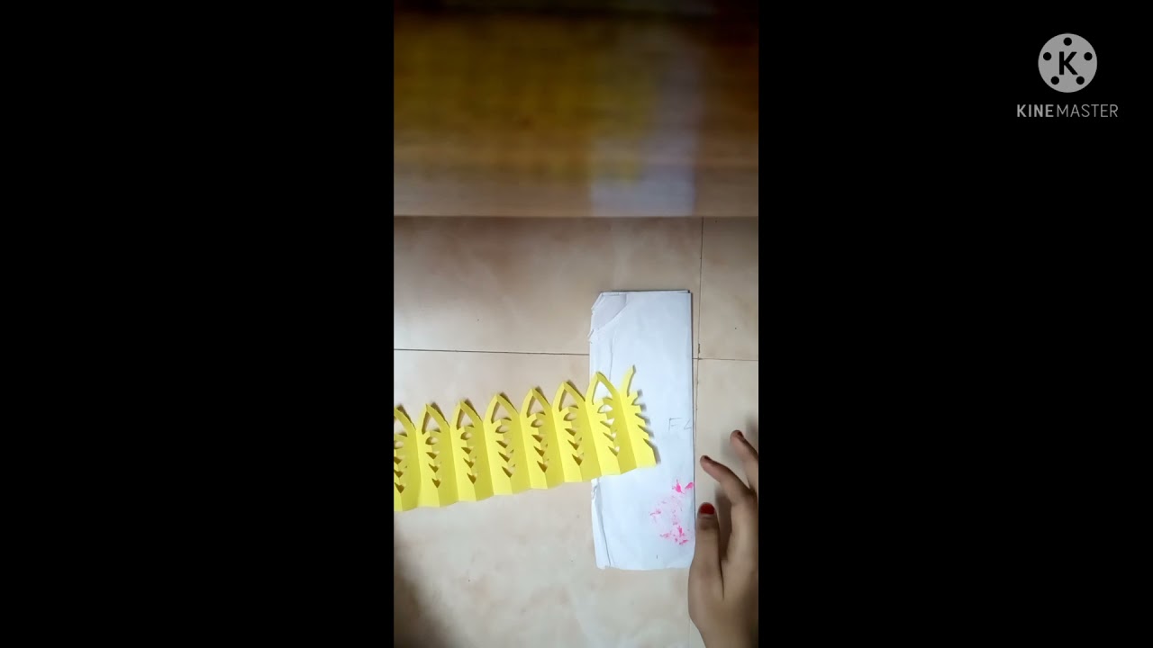 Simple paper snowflake wall hanging - wall decoration ideas - colour paper snowflakes