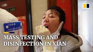 Mass disinfection, testing in northwestern Chinese city of Xian as Covid-19 cases surge