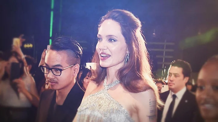 See Angelina Jolie Reunite With Son Maddox for Fir...