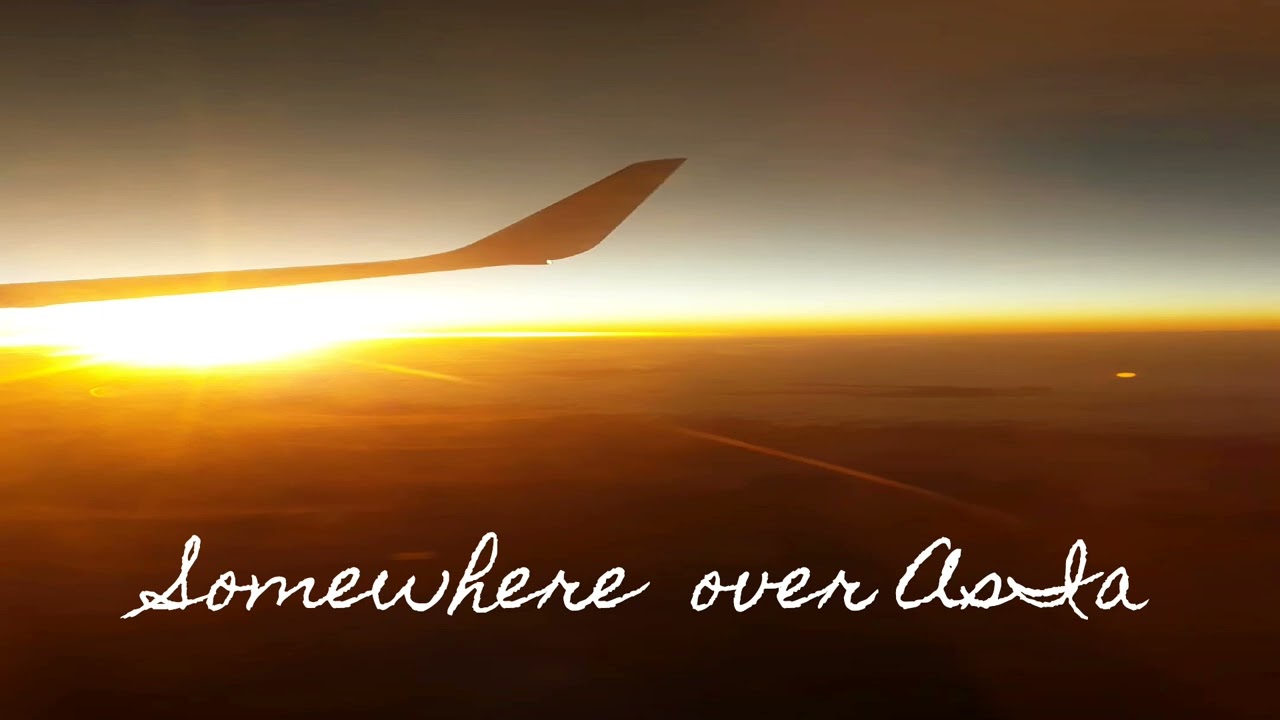 Somewhere Over Asia 35000 feet love life 