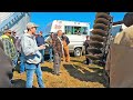 Iowa farm auction searching for equipment