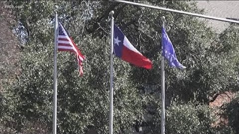 Why are flags at half mast today arkansas