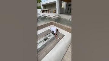 What happens when it rains in a sunken seating area? 🤔🌧️ #luxuryhome #backyarddesign #pool