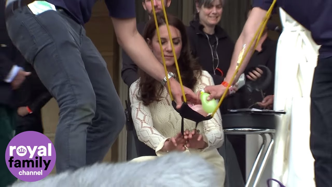 Kate and Prince Harry shoot water balloons at Prince William