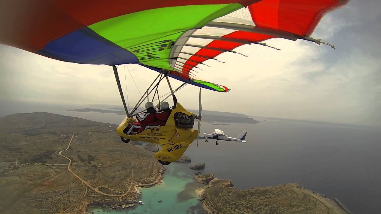 weightshift control trike 9HUDJ over Blue Lagoon Comino Malta YouTube