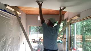 How a redneck hangs drywall by his self. #construction #sheetrock #tipsandtricks #tips #diy #diyer