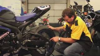 How to Adjust a Motorcycle Chain | Motorcycles(Watch more Motorcycle Videos for Bikers videos: http://www.howcast.com/videos/482948-How-to-Adjust-a-Motorcycle-Chain-Motorcycles My name is Kenyon ..., 2011-08-05T14:11:56.000Z)