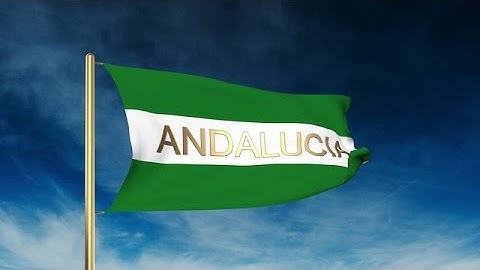 Andalucia Flag Slider Style With Title. Waving In The Wind With Cloud Background Stock Animation