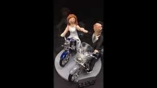 Bride and groom on motorcycles wedding cake topper