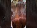 Escova Progressiva a base de ácido. O ácido desbota a cor do cabelo, por isso a mudança de cor.