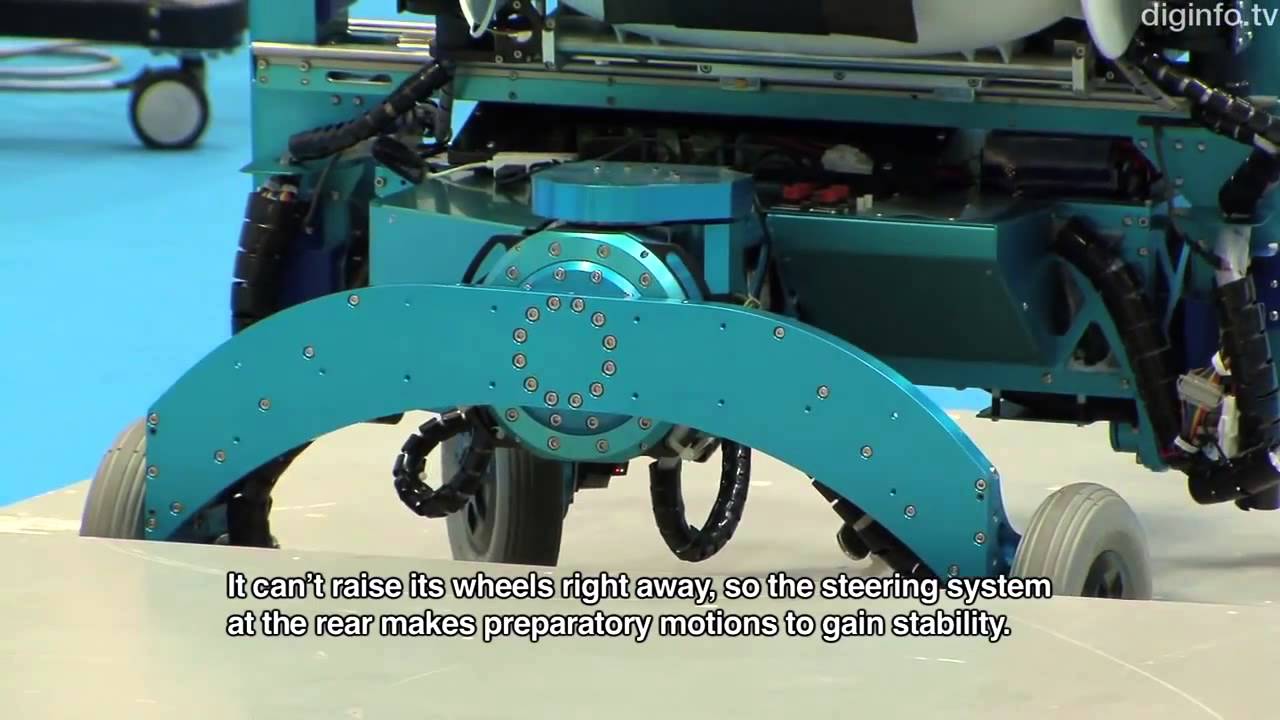 Robotic wheelchair from Chiba Tech turns wheels into legs and climbs over steps ipnexus YouTube