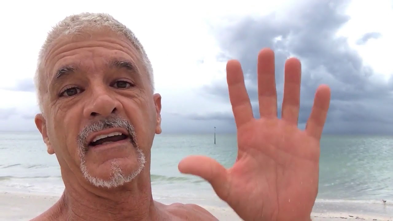 Man Collects Multitude of Shark Teeth at Manasota Key, Florida
