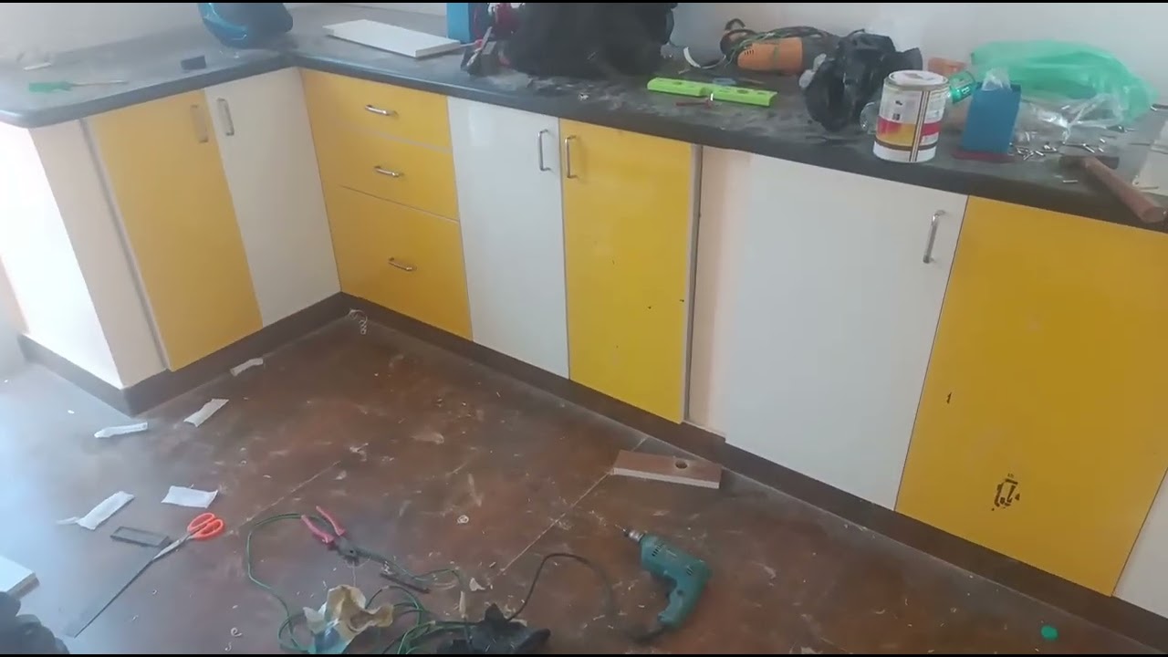 Kitchen interior decorate. Tiles kitchen electric work plumbing work