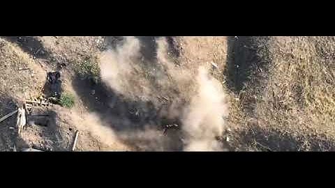 Drone footage shows terrifying moment a trench bomb dropped by military aircraft detonates