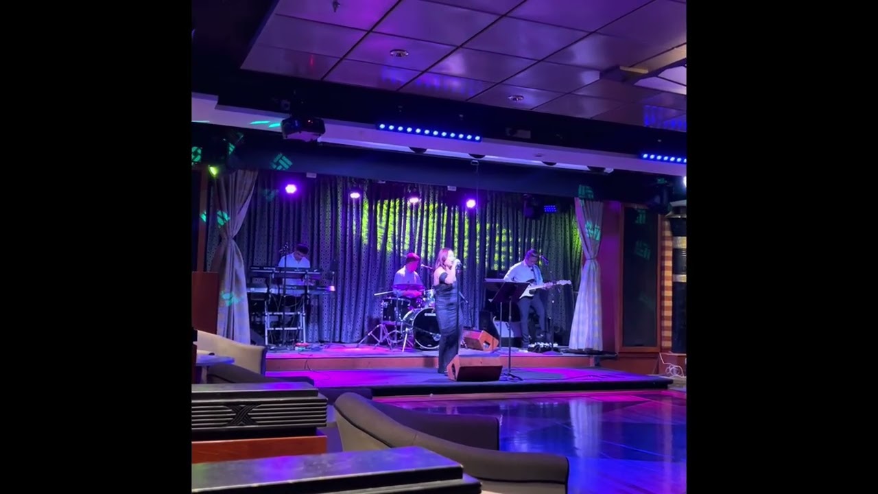 Freedom of the Cruise, Pilipino band. She have a nice voice which I enjoy her performance! 