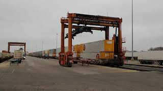 Mi Jack Intermodal Crane lifts off Estes Containers
