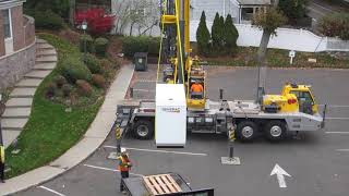 New Library Generator Is Lowered Into Place By Crane