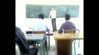 Angry teacher whacks student