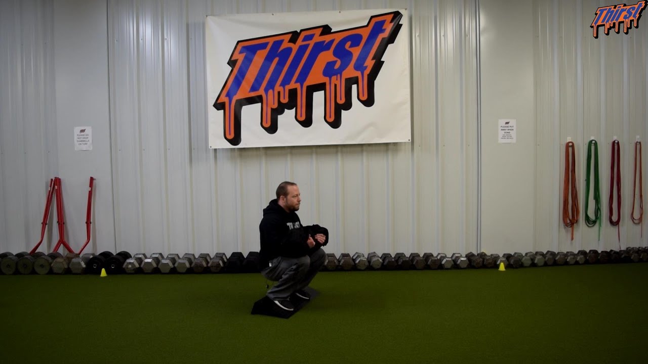 Heels Elevated Sandbag Zercher Squat - THIRSTgym.com - YouTube